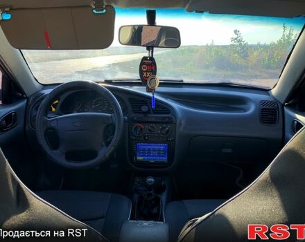 Синій Деу Ланос, об'ємом двигуна 1.6 л та пробігом 106 тис. км за 2900 $, фото 12 на Automoto.ua