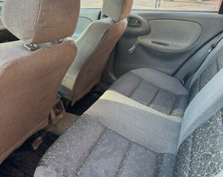 Синій Деу Ланос, об'ємом двигуна 1.5 л та пробігом 346 тис. км за 1050 $, фото 10 на Automoto.ua