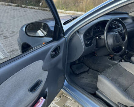 Синій Деу Ланос, об'ємом двигуна 1.5 л та пробігом 116 тис. км за 3700 $, фото 9 на Automoto.ua