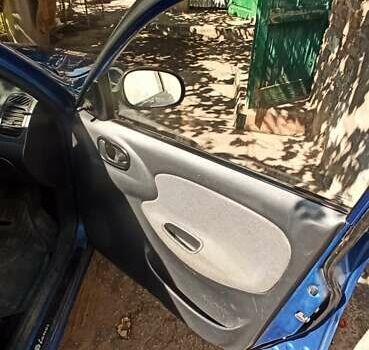 Синий Дэу Ланос, объемом двигателя 1.5 л и пробегом 170 тыс. км за 1850 $, фото 11 на Automoto.ua