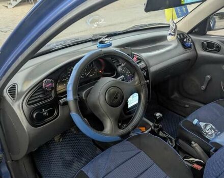 Синий Дэу Ланос, объемом двигателя 1.5 л и пробегом 330 тыс. км за 2500 $, фото 4 на Automoto.ua