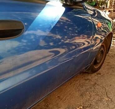 Синий Дэу Ланос, объемом двигателя 1.5 л и пробегом 170 тыс. км за 1850 $, фото 15 на Automoto.ua