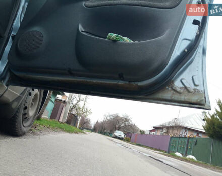 Синий Дэу Ланос, объемом двигателя 1.6 л и пробегом 310 тыс. км за 2200 $, фото 16 на Automoto.ua