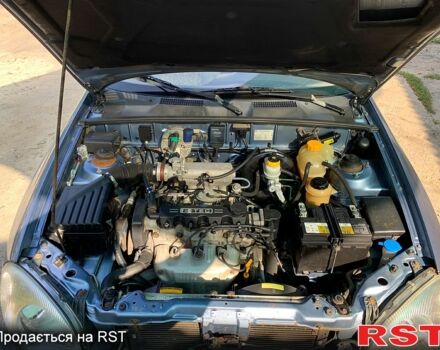 Синий Дэу Ланос, объемом двигателя 1.5 л и пробегом 125 тыс. км за 2800 $, фото 10 на Automoto.ua