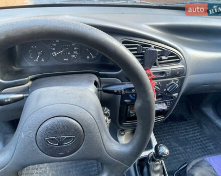 Синий Дэу Ланос, объемом двигателя 1.5 л и пробегом 102 тыс. км за 2600 $, фото 3 на Automoto.ua