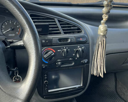 Синій Деу Ланос, об'ємом двигуна 1.5 л та пробігом 116 тис. км за 3700 $, фото 17 на Automoto.ua