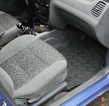 Синій Деу Ланос, об'ємом двигуна 1.6 л та пробігом 265 тис. км за 1900 $, фото 7 на Automoto.ua