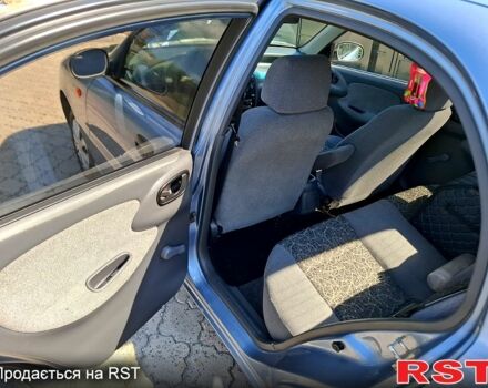 Синий Дэу Ланос, объемом двигателя 1.5 л и пробегом 155 тыс. км за 2600 $, фото 3 на Automoto.ua