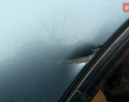 Синий Дэу Ланос, объемом двигателя 1.6 л и пробегом 310 тыс. км за 2200 $, фото 12 на Automoto.ua