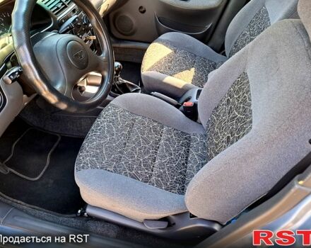 Синий Дэу Ланос, объемом двигателя 1.5 л и пробегом 155 тыс. км за 2600 $, фото 4 на Automoto.ua