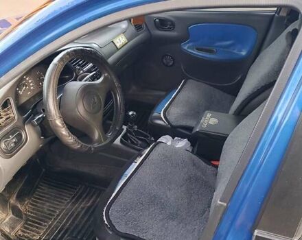 Синий Дэу Ланос, объемом двигателя 1.5 л и пробегом 141 тыс. км за 3600 $, фото 3 на Automoto.ua