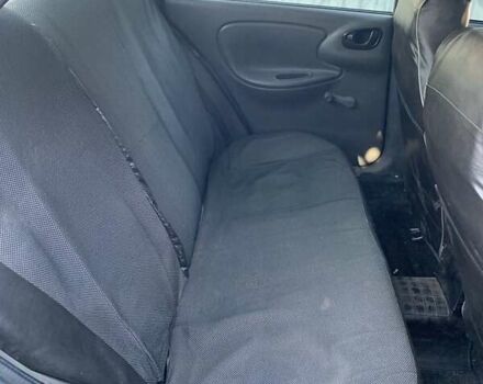 Синий Дэу Ланос, объемом двигателя 1.5 л и пробегом 100 тыс. км за 2000 $, фото 5 на Automoto.ua