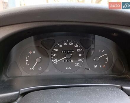 Синій Деу Ланос, об'ємом двигуна 1.39 л та пробігом 167 тис. км за 2400 $, фото 11 на Automoto.ua