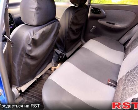 Синий Дэу Ланос, объемом двигателя 1.5 л и пробегом 210 тыс. км за 2570 $, фото 11 на Automoto.ua
