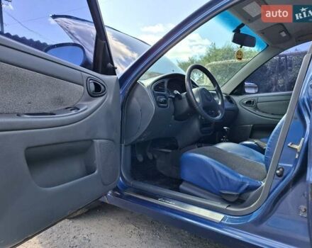 Синий Дэу Ланос, объемом двигателя 1.5 л и пробегом 153 тыс. км за 3500 $, фото 16 на Automoto.ua