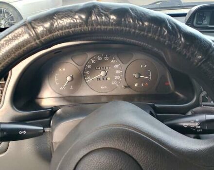 Синий Дэу Ланос, объемом двигателя 1.5 л и пробегом 141 тыс. км за 3600 $, фото 1 на Automoto.ua