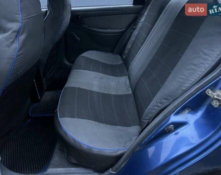 Синий Дэу Ланос, объемом двигателя 1.5 л и пробегом 243 тыс. км за 2500 $, фото 7 на Automoto.ua