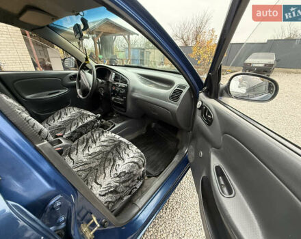 Синий Дэу Ланос, объемом двигателя 1.35 л и пробегом 250 тыс. км за 2500 $, фото 9 на Automoto.ua