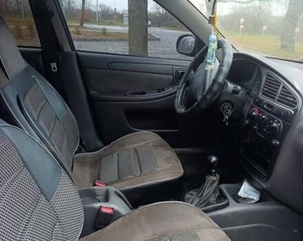 Синий Дэу Ланос, объемом двигателя 1.6 л и пробегом 280 тыс. км за 1750 $, фото 5 на Automoto.ua