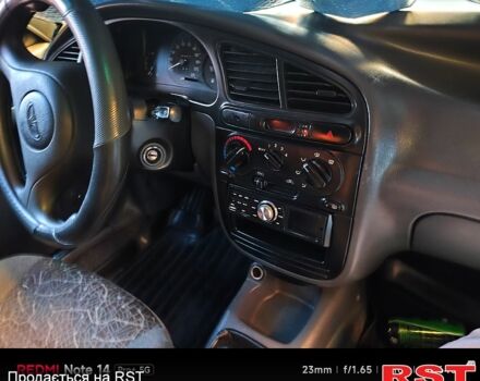 Синій Деу Ланос, об'ємом двигуна 1.5 л та пробігом 228 тис. км за 1650 $, фото 1 на Automoto.ua