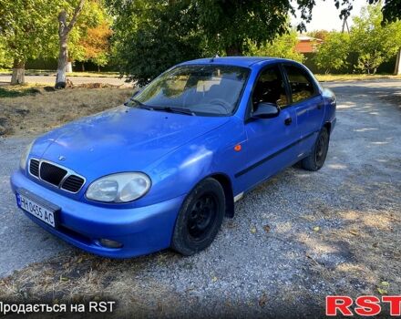 Синий Дэу Ланос, объемом двигателя 1.5 л и пробегом 305 тыс. км за 1950 $, фото 1 на Automoto.ua