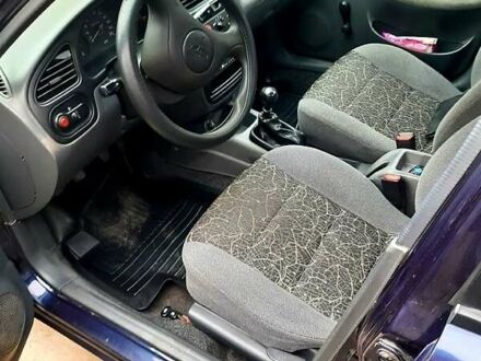 Синий Дэу Ланос, объемом двигателя 1.5 л и пробегом 220 тыс. км за 2000 $, фото 1 на Automoto.ua