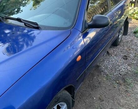 Синій Деу Ланос, об'ємом двигуна 1.5 л та пробігом 100 тис. км за 2000 $, фото 1 на Automoto.ua