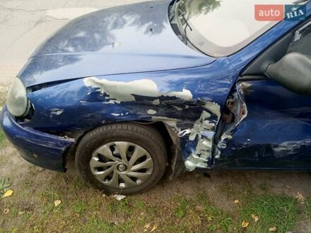 Синій Деу Ланос, об'ємом двигуна 1.5 л та пробігом 243 тис. км за 1250 $, фото 1 на Automoto.ua