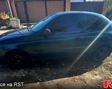 Дэу Ланос 1998 в Запорожье на Automoto.ua Зеленый Дэу Ланос, объемом двигателя 1.5 л и пробегом 233 тыс. км за 2900 $, фото 4 на Automoto.ua