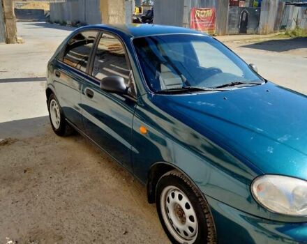 Зеленый Дэу Ланос, объемом двигателя 1.5 л и пробегом 340 тыс. км за 1900 $, фото 3 на Automoto.ua