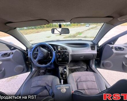 Дэу Ланос 1998 в Глобино на Automoto.ua Зеленый Дэу Ланос, объемом двигателя 1.5 л и пробегом 210 тыс. км за 2300 $, фото 6 на Automoto.ua