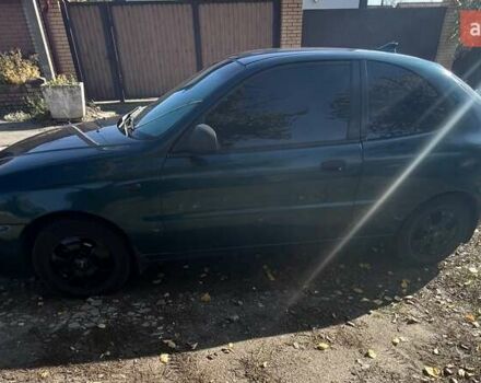 Зеленый Дэу Ланос, объемом двигателя 1.5 л и пробегом 233 тыс. км за 2850 $, фото 5 на Automoto.ua