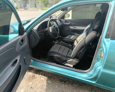 Зеленый Дэу Ланос, объемом двигателя 1.5 л и пробегом 230 тыс. км за 2200 $, фото 4 на Automoto.ua