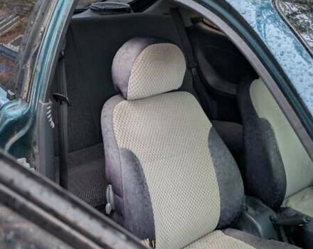 Зеленый Дэу Ланос, объемом двигателя 1.5 л и пробегом 176 тыс. км за 1600 $, фото 4 на Automoto.ua