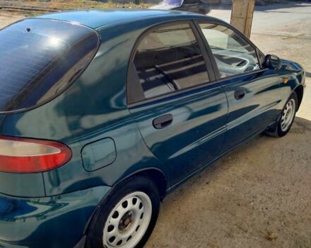 Зеленый Дэу Ланос, объемом двигателя 1.5 л и пробегом 340 тыс. км за 1900 $, фото 6 на Automoto.ua