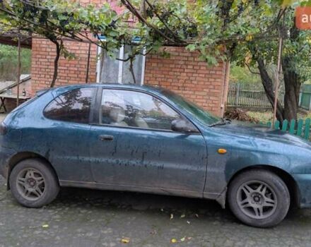 Зеленый Дэу Ланос, объемом двигателя 1.5 л и пробегом 176 тыс. км за 1600 $, фото 7 на Automoto.ua