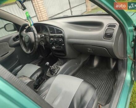 Зеленый Дэу Ланос, объемом двигателя 1.5 л и пробегом 387 тыс. км за 1800 $, фото 3 на Automoto.ua