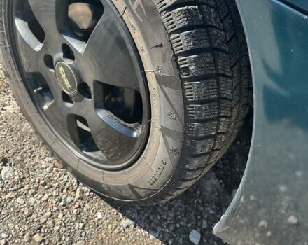 Зеленый Дэу Ланос, объемом двигателя 1.5 л и пробегом 233 тыс. км за 2850 $, фото 4 на Automoto.ua