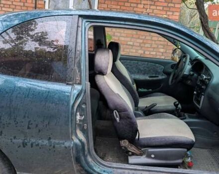 Зеленый Дэу Ланос, объемом двигателя 1.5 л и пробегом 176 тыс. км за 1600 $, фото 2 на Automoto.ua