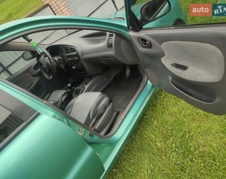 Зеленый Дэу Ланос, объемом двигателя 1.5 л и пробегом 387 тыс. км за 1800 $, фото 7 на Automoto.ua