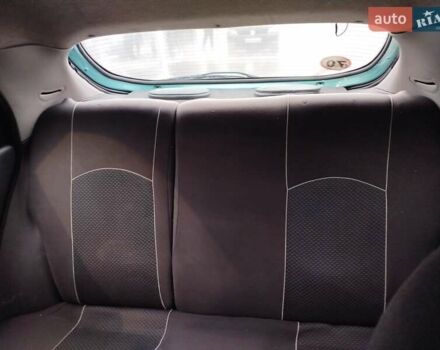 Зеленый Дэу Ланос, объемом двигателя 1.5 л и пробегом 190 тыс. км за 2200 $, фото 6 на Automoto.ua