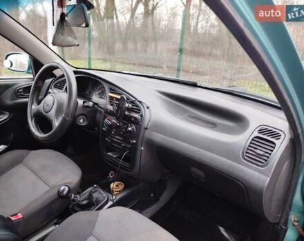 Зеленый Дэу Ланос, объемом двигателя 1.5 л и пробегом 190 тыс. км за 2200 $, фото 4 на Automoto.ua