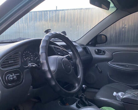 Зелений Деу Ланос, об'ємом двигуна 1.5 л та пробігом 350 тис. км за 1900 $, фото 6 на Automoto.ua