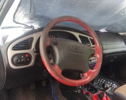 Зеленый Дэу Ланос, объемом двигателя 1.6 л и пробегом 192 тыс. км за 2600 $, фото 3 на Automoto.ua