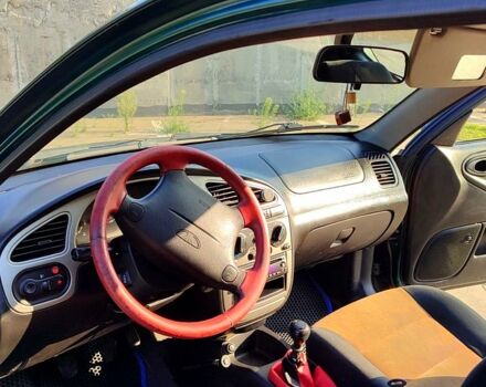 Зеленый Дэу Ланос, объемом двигателя 1.6 л и пробегом 193 тыс. км за 2500 $, фото 5 на Automoto.ua