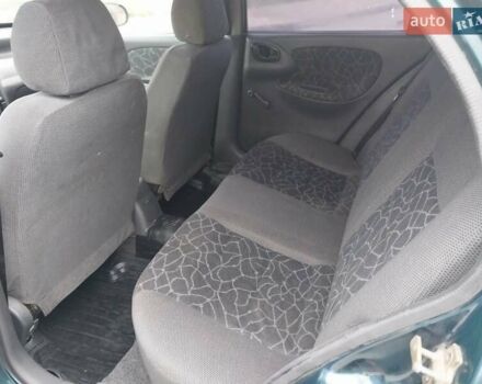 Зеленый Дэу Ланос, объемом двигателя 1.5 л и пробегом 300 тыс. км за 2150 $, фото 6 на Automoto.ua