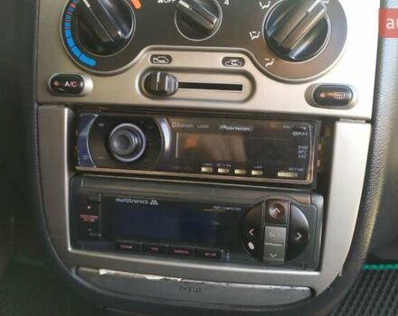 Зелений Деу Ланос, об'ємом двигуна 1.6 л та пробігом 339 тис. км за 3500 $, фото 39 на Automoto.ua