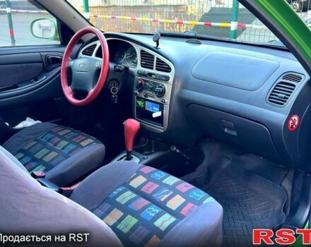 Зеленый Дэу Ланос, объемом двигателя 1.6 л и пробегом 175 тыс. км за 2099 $, фото 9 на Automoto.ua