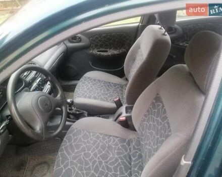 Зеленый Дэу Ланос, объемом двигателя 1.5 л и пробегом 228 тыс. км за 2500 $, фото 14 на Automoto.ua