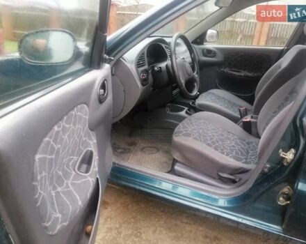 Зеленый Дэу Ланос, объемом двигателя 1.5 л и пробегом 228 тыс. км за 2500 $, фото 16 на Automoto.ua